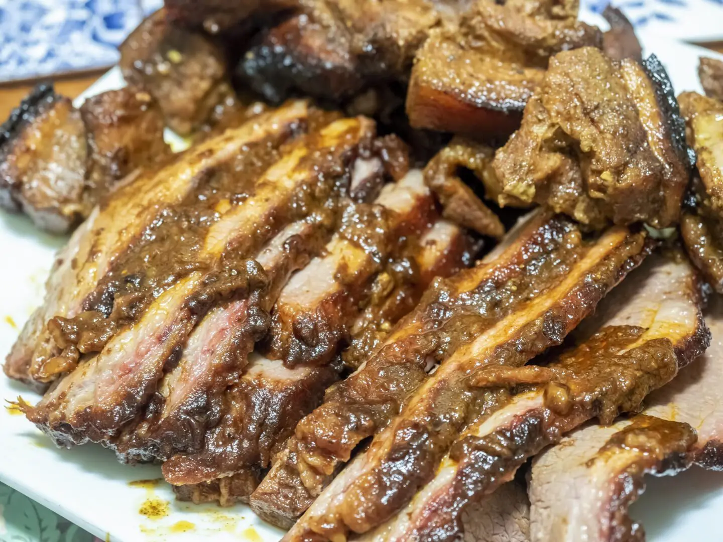 Sliced glazed ribs on a plate