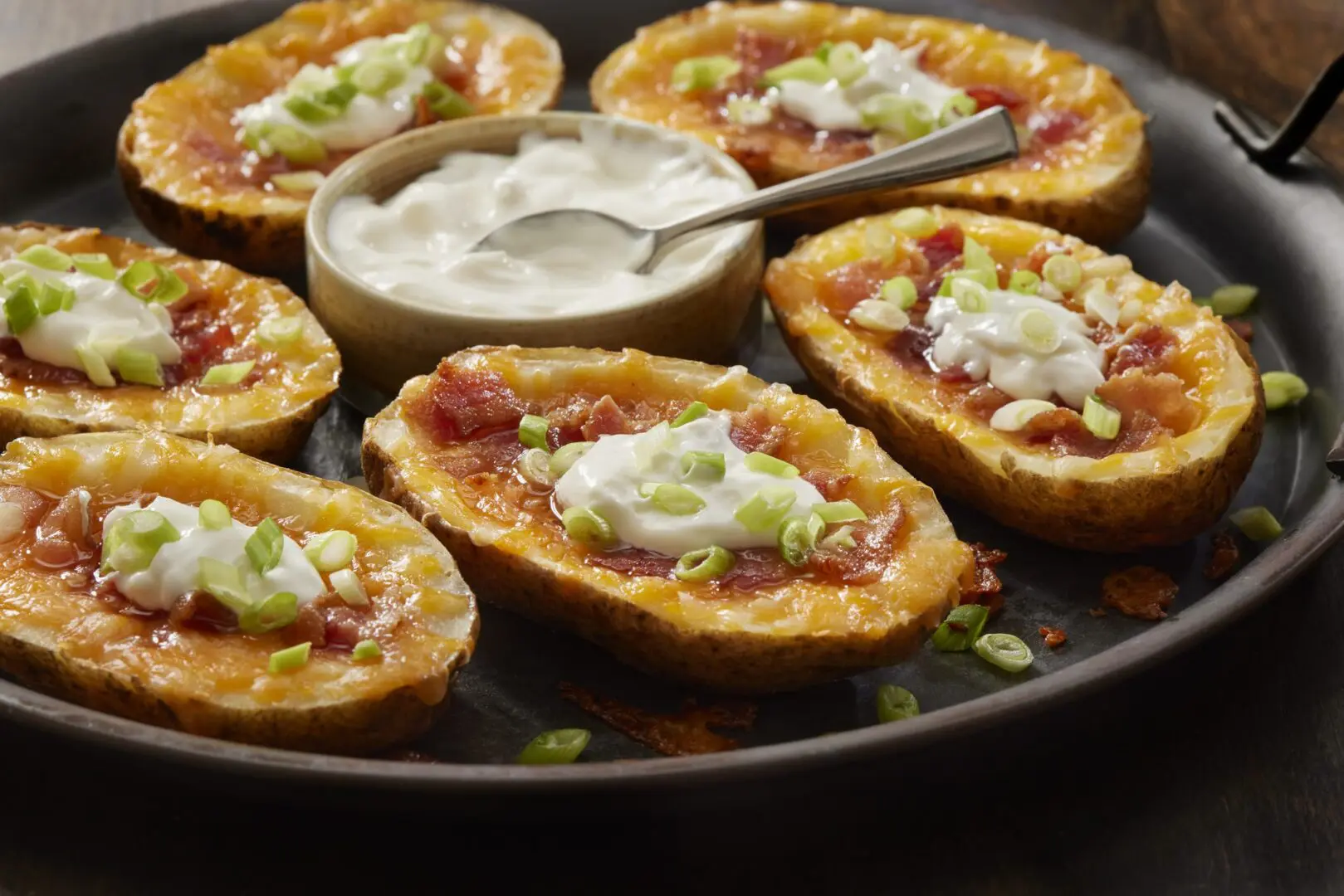 Loaded potato skins with bacon and sour cream