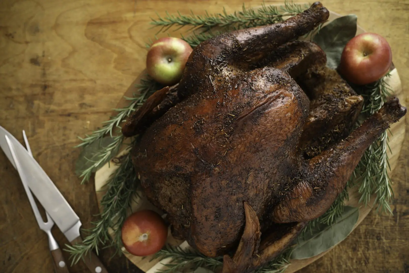 Roasted whole turkey with rosemary and apples