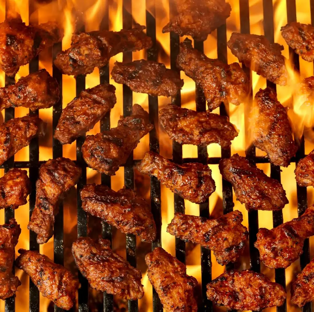 Barbecue chicken wings with fiery background