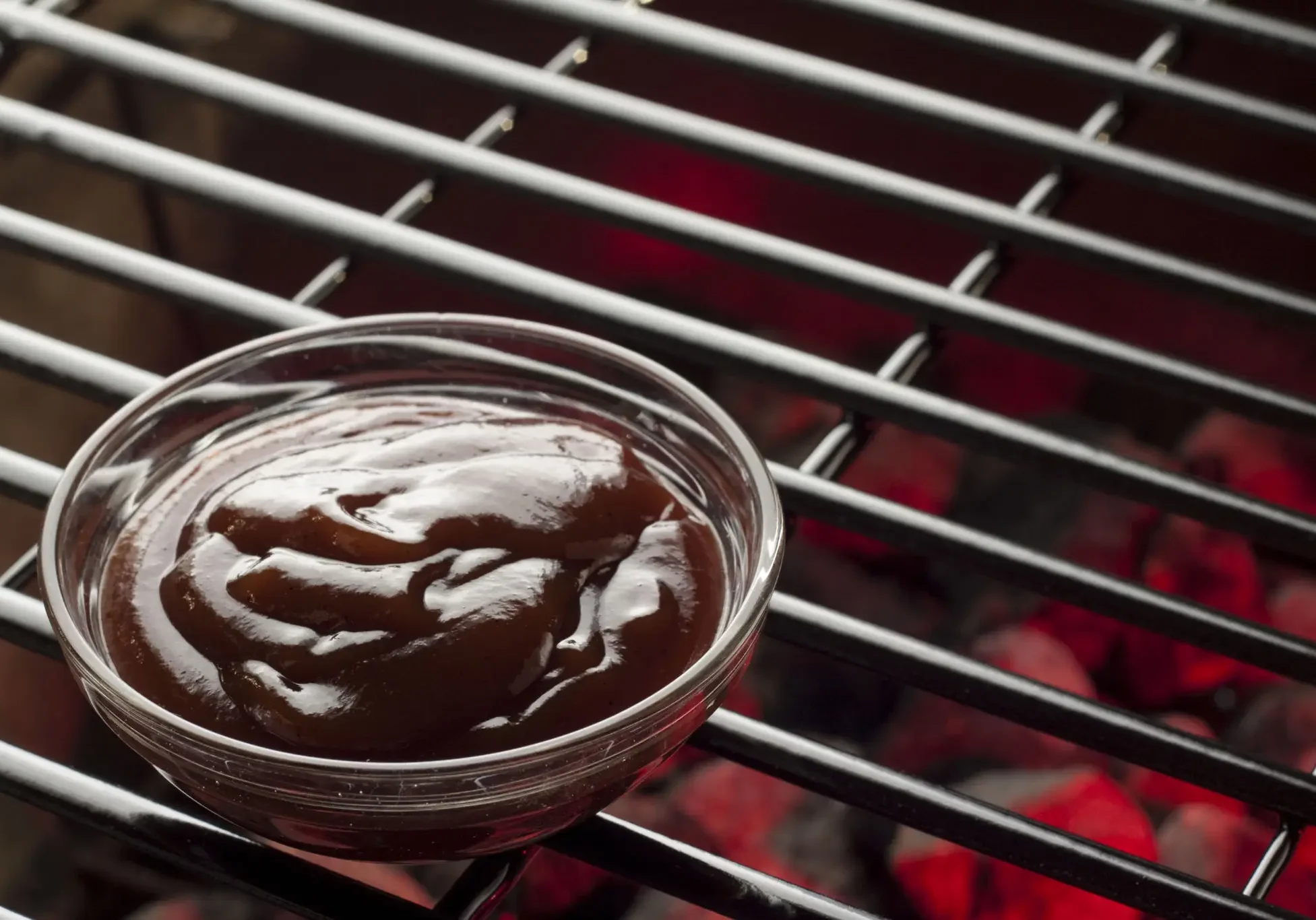 Grilling sauce on barbecue grate